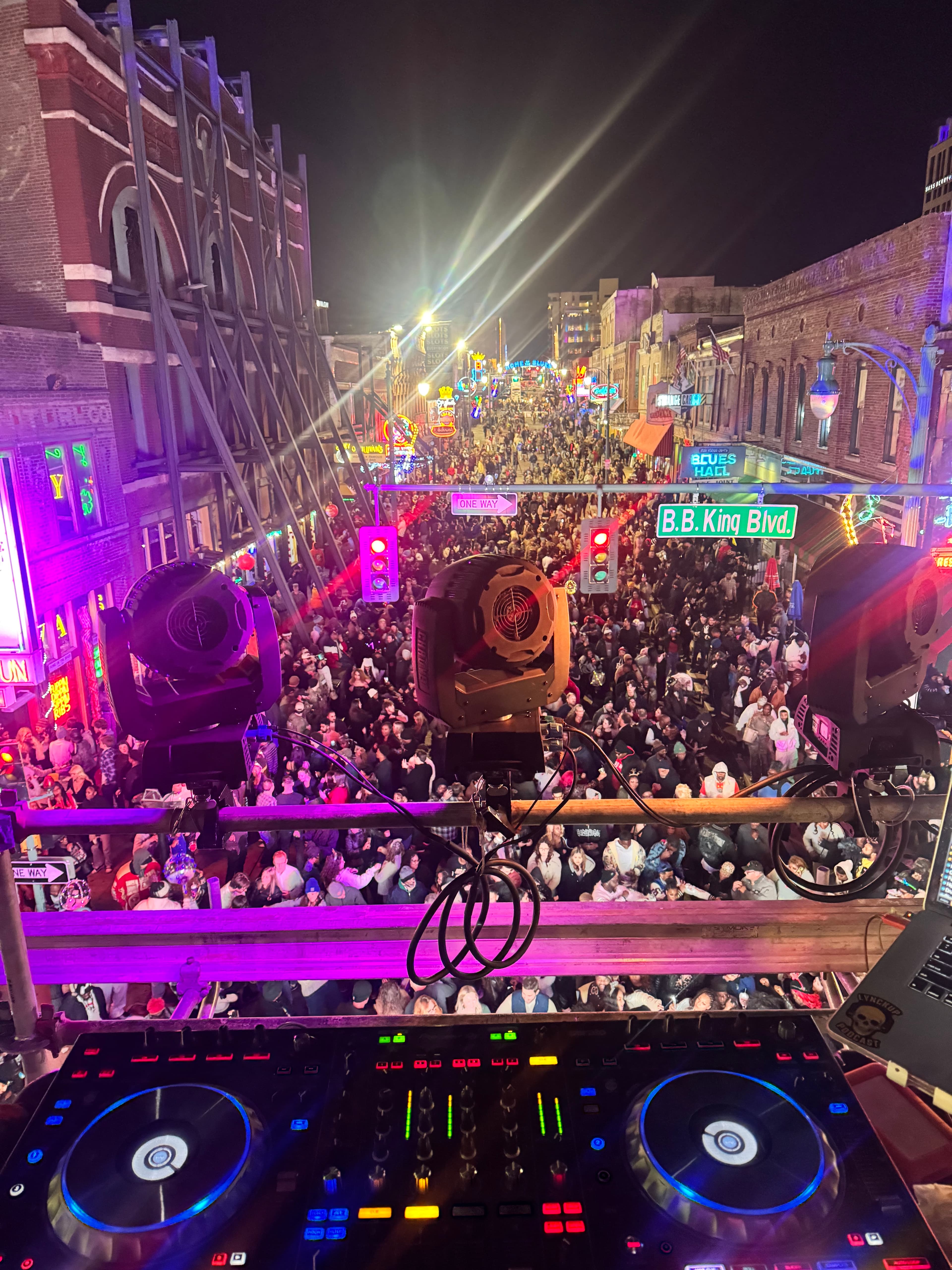 DJ Ben Murray at New Year's Eve on Beale Street 2026 - tower stage and crowd